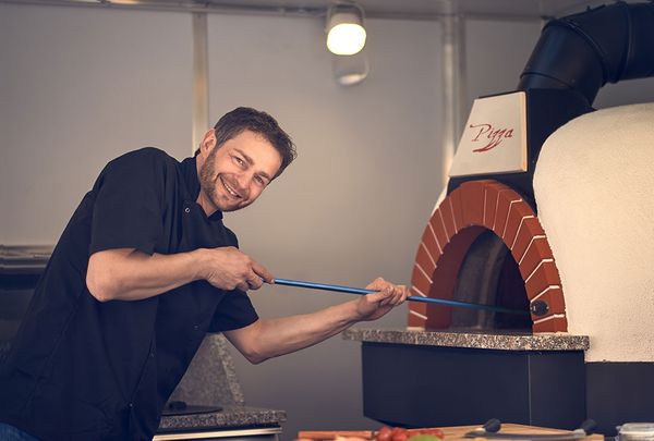 Pelle à pizza en acier inox - Ø 23 cm - perforée